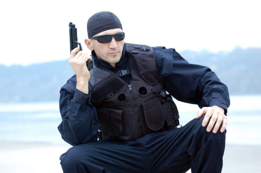 Security man with gun.