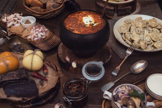Russian borsch at pot on the table