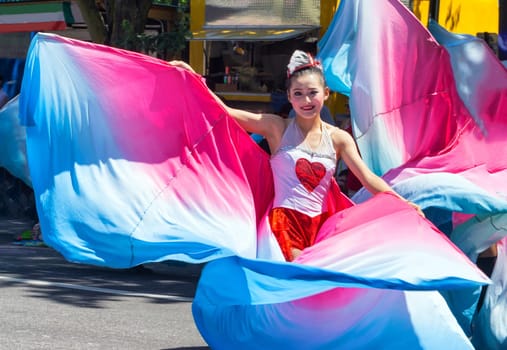 PORTLAND, OR - JUNE 6: Dancer in the Grand Floral Parade as part of the Rose Festival in Portland, Oregon on June 6, 2015