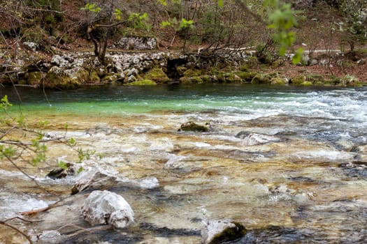 mountain fast colorful spring river stream can be background
