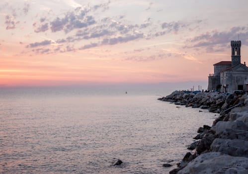 colorful beautiful sunset over Adriatic sea in Piran