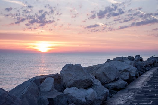 colorful beautiful sunset over Adriatic sea in Piran
