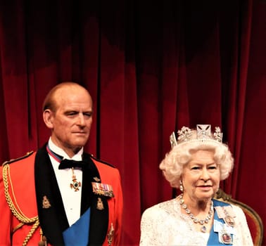 London, United Kingdom - March 20, 2017: Queen Elizabeth ii 2 & Prince Philip portrait waxwork wax figure at museum, London