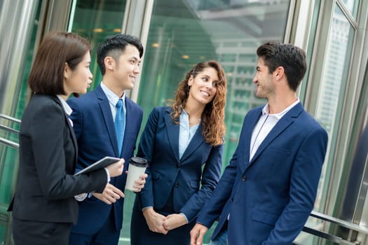 Group of business team talking to each other