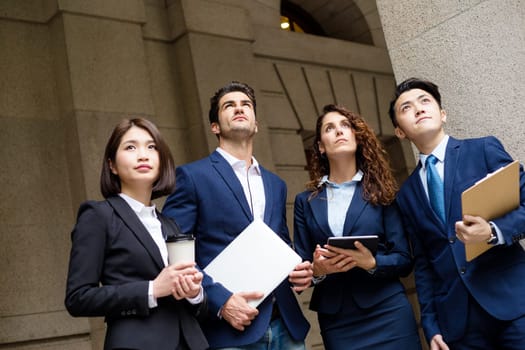 Business people looking up