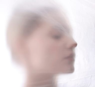 Woman behind foil