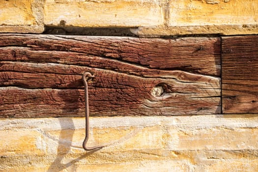 Detail of cracked painted oak timber European-known style, half-timbered building