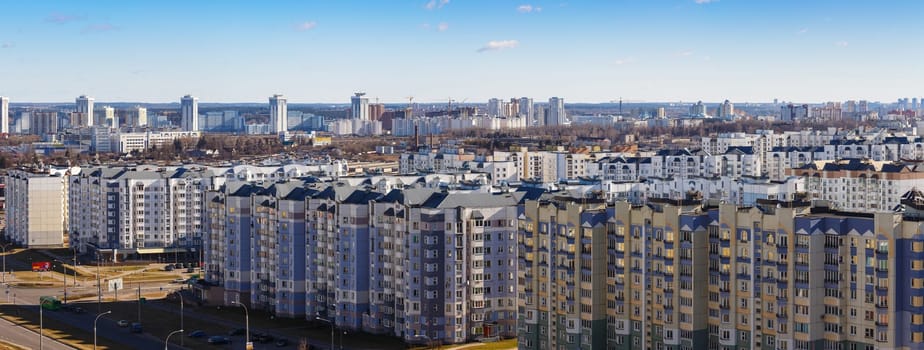 Modern city landscape. Residential multi-storey reinforced concrete buildings.