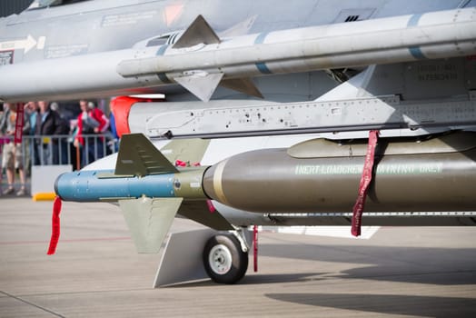 LEEUWARDEN, NETHERLANDS - JUNE 10, 2016: F16 fighter jet with a dummy rocket on its wing during the dutch air force open days