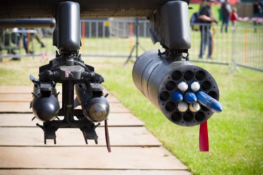 dummy rockets under an AH-64 apache helicopter