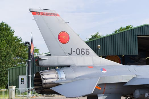 LEEUWARDEN, NETHERLANDS - JUNE 10, 2016: Tail of an F-16 fighting falcon at the Dutch Air Force open days.