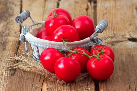 fresh tomatoes in a basket