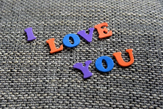 I love You on fabric background