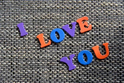 I love You on fabric background