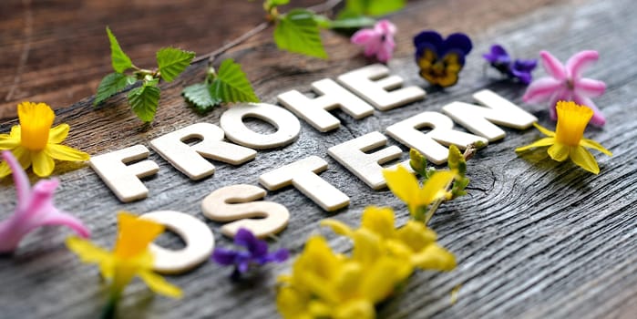 Happy Easter on a wooden background