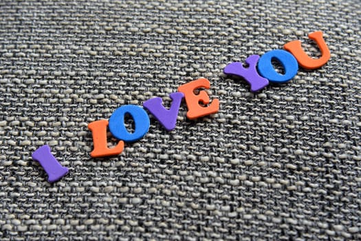 I love You on fabric background