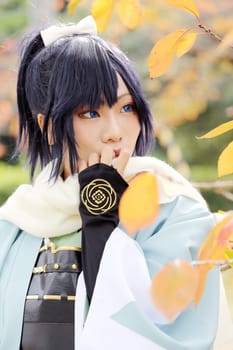 Kagawa, Japan - November 20, 2016: Young japanese girl dressed in cosplay costume at Mamugame-Jou Park. Photo taken in Marugame Cosplay Convention during a meeting of cosplayer.