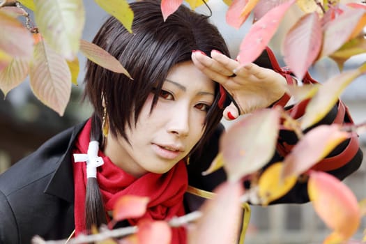 Kagawa, Japan - November 20, 2016: Young japanese girl dressed in cosplay costume at Mamugame-Jou Park. Photo taken in Marugame Cosplay Convention during a meeting of cosplayer.