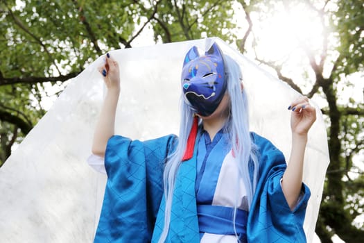 Kagawa, Japan - November 20, 2016: Young japanese girl dressed in cosplay costume at Mamugame-Jou Park. Photo taken in Marugame Cosplay Convention during a meeting of cosplayer.