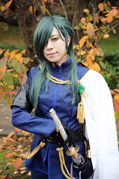 Kagawa, Japan - November 20, 2016: Young japanese girl dressed in cosplay costume at Mamugame-Jou Park. Photo taken in Marugame Cosplay Convention during a meeting of cosplayer.