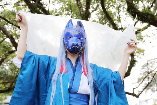 Kagawa, Japan - November 20, 2016: Young japanese girl dressed in cosplay costume at Mamugame-Jou Park. Photo taken in Marugame Cosplay Convention during a meeting of cosplayer.