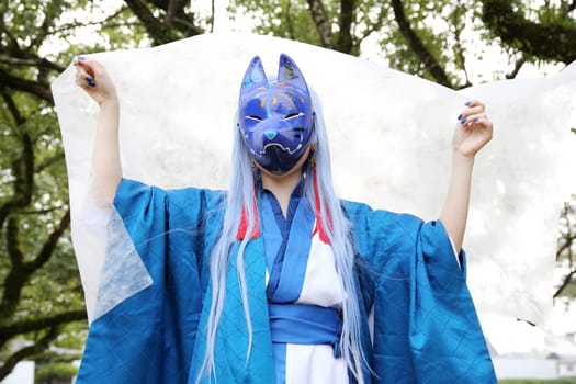Kagawa, Japan - November 20, 2016: Young japanese girl dressed in cosplay costume at Mamugame-Jou Park. Photo taken in Marugame Cosplay Convention during a meeting of cosplayer.