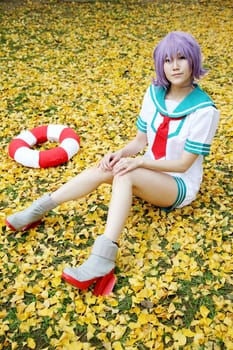 Kagawa, Japan - November 20, 2016: Young japanese girl dressed in cosplay costume at Mamugame-Jou Park. Photo taken in Marugame Cosplay Convention during a meeting of cosplayer.