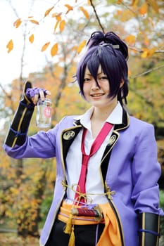 Kagawa, Japan - November 20, 2016: Young japanese girl dressed in cosplay costume at Mamugame-Jou Park. Photo taken in Marugame Cosplay Convention during a meeting of cosplayer.