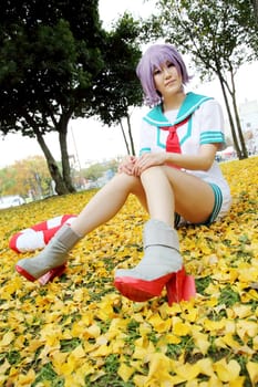 Kagawa, Japan - November 20, 2016: Young japanese girl dressed in cosplay costume at Mamugame-Jou Park. Photo taken in Marugame Cosplay Convention during a meeting of cosplayer.
