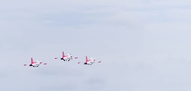 LEEUWARDEN, NETHERLANDS - JUNE 6, 2016: Turkish Star air force demonstration tean performing their stunts during the Dutch Air Force open days