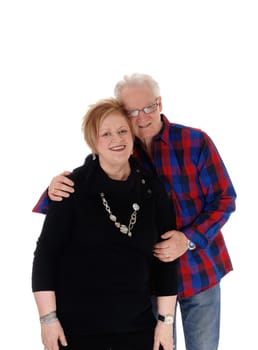 A lovely older couple standing in casual cloth, hugging each other, .smiling, isolated for white background..