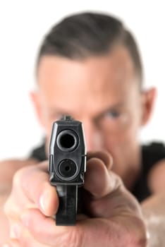 Man with tactical vest and gun isolated in white