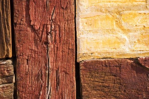 Detail of cracked painted oak timber European-known style, half-timbered building