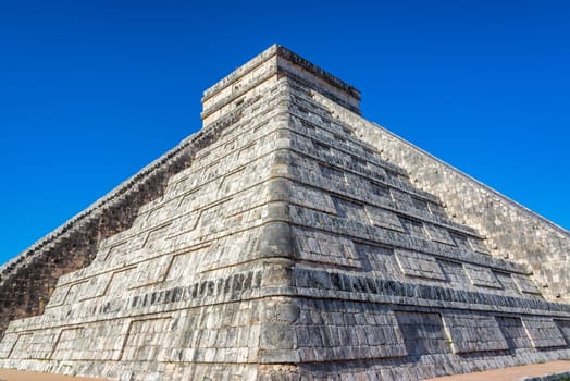 Closeup view of the pyramid known as El Castillo in the ruined Mayan city of Chichen Itza in Mexico
