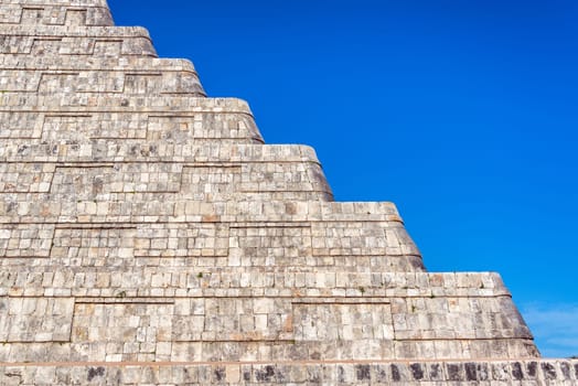 Closeup view of the platforms of the pyramid in the ancient city of Chichen Itza in Mexico