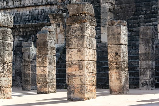 Columns in front the the temple of the warriors in the ruins of Chichen Itza, Mexico