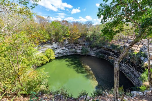 Sacred Cenote in the site of the ruins of Chichen Itza, Mexico