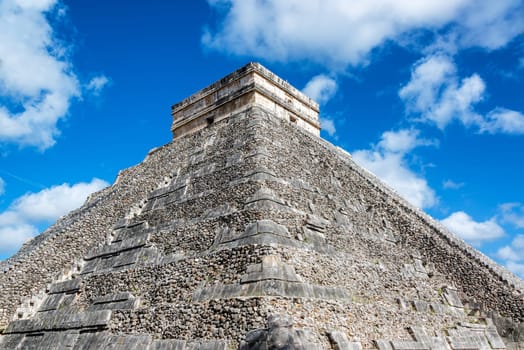 Beautiful view of the Pyramid of Kukulcan, also known as El Castillo, in the ruins of Chichen Itza in Mexico