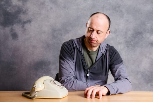young man waiting for a important phone call