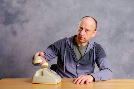 young man take the phone for a phone call