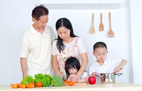 Asian family in the kitchen
