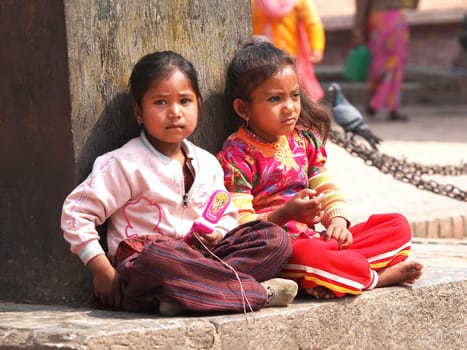 kids sitting on the street of kathmandu,Nepal