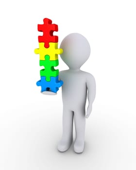 3d person is holding vertically four different puzzle pieces