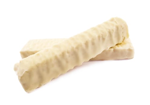 White chocolate bar with filling, on White background.