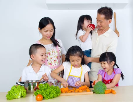 Asian family in the kitchen