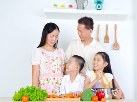 Asian family in the kitchen