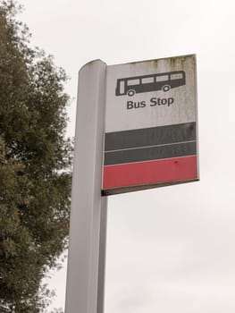 a bus stop sign with a bus vector icon white and black and red waiting stop get off fare