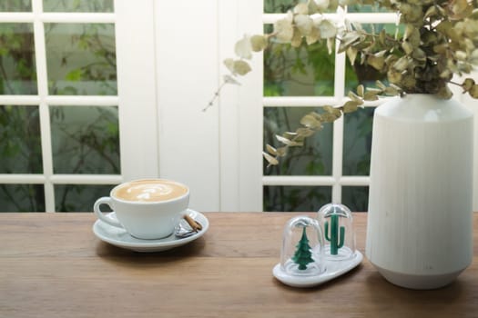 Coffee With Latte Art On Wooden Table, stock photo