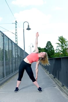Woman does stretching exercise