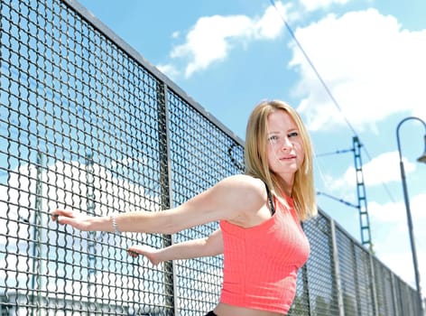 Woman does stretching exercise